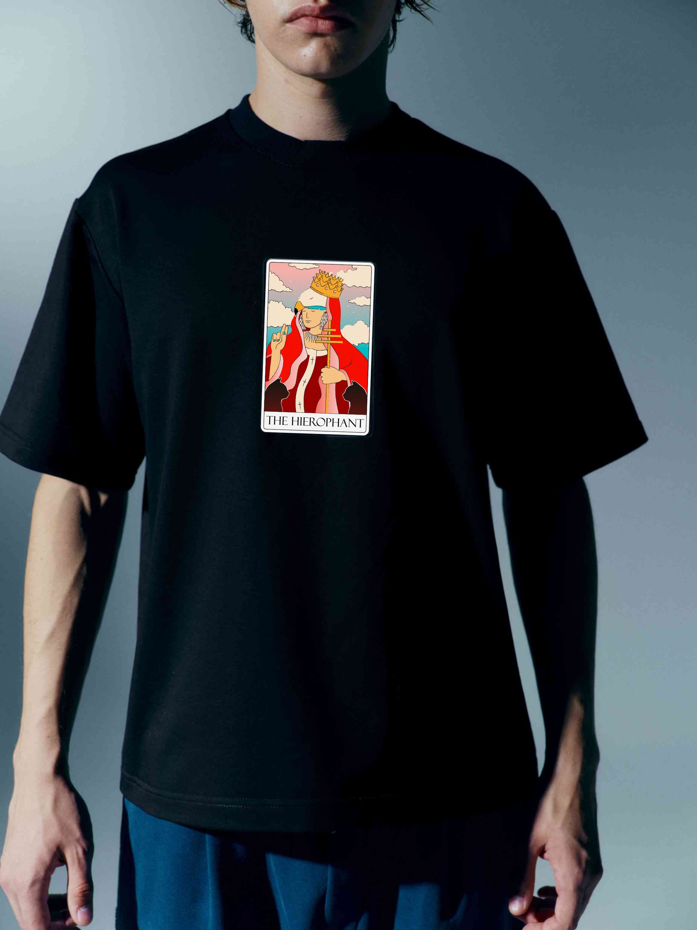 Unisex cotton t-shirt featuring an intricate Tarot card design, from 'The Moon' collection, with a stylish stand-up collar for an elevated look
