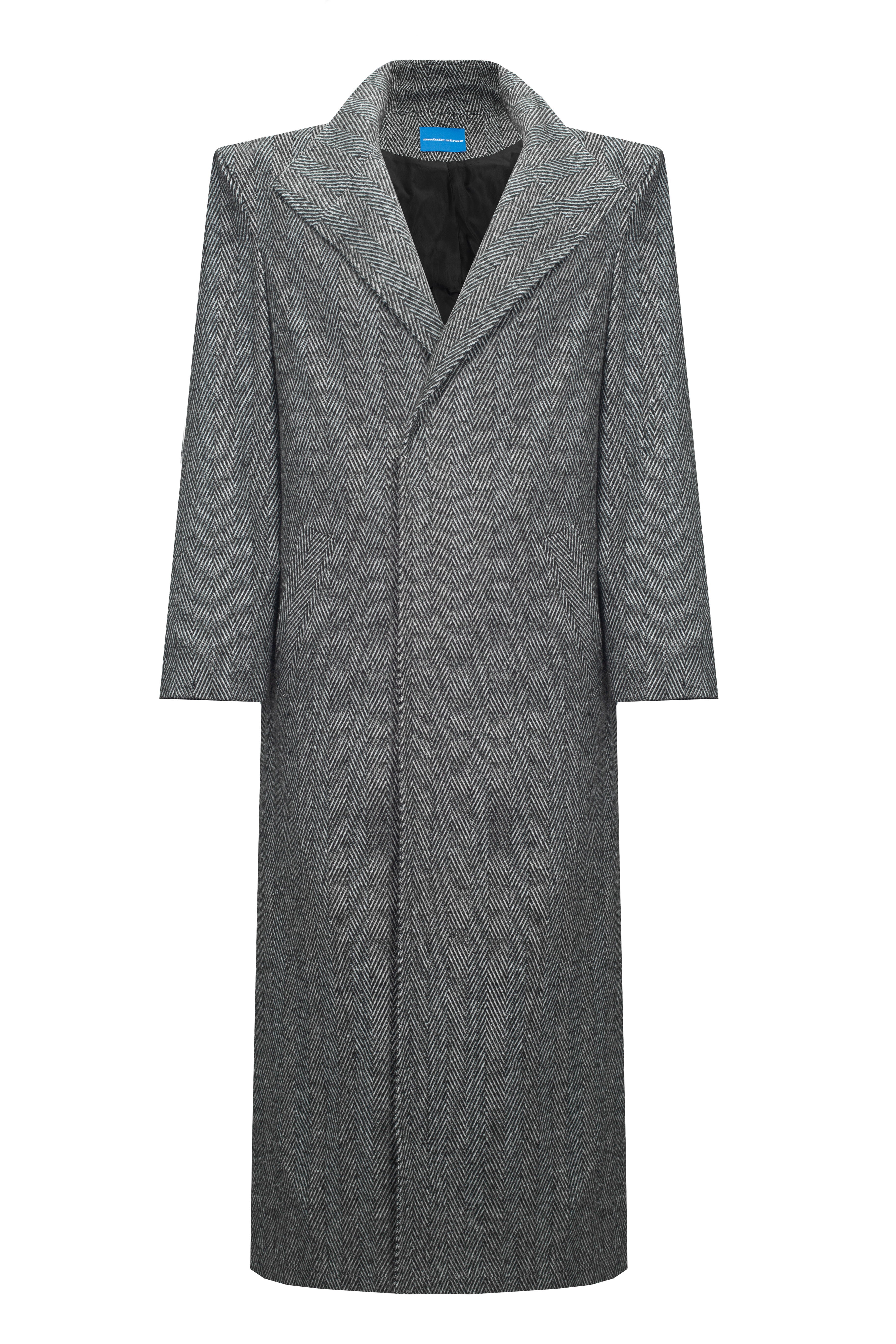 Close-up of the coat's textured fabric, illustrating its substantial yet refined composition