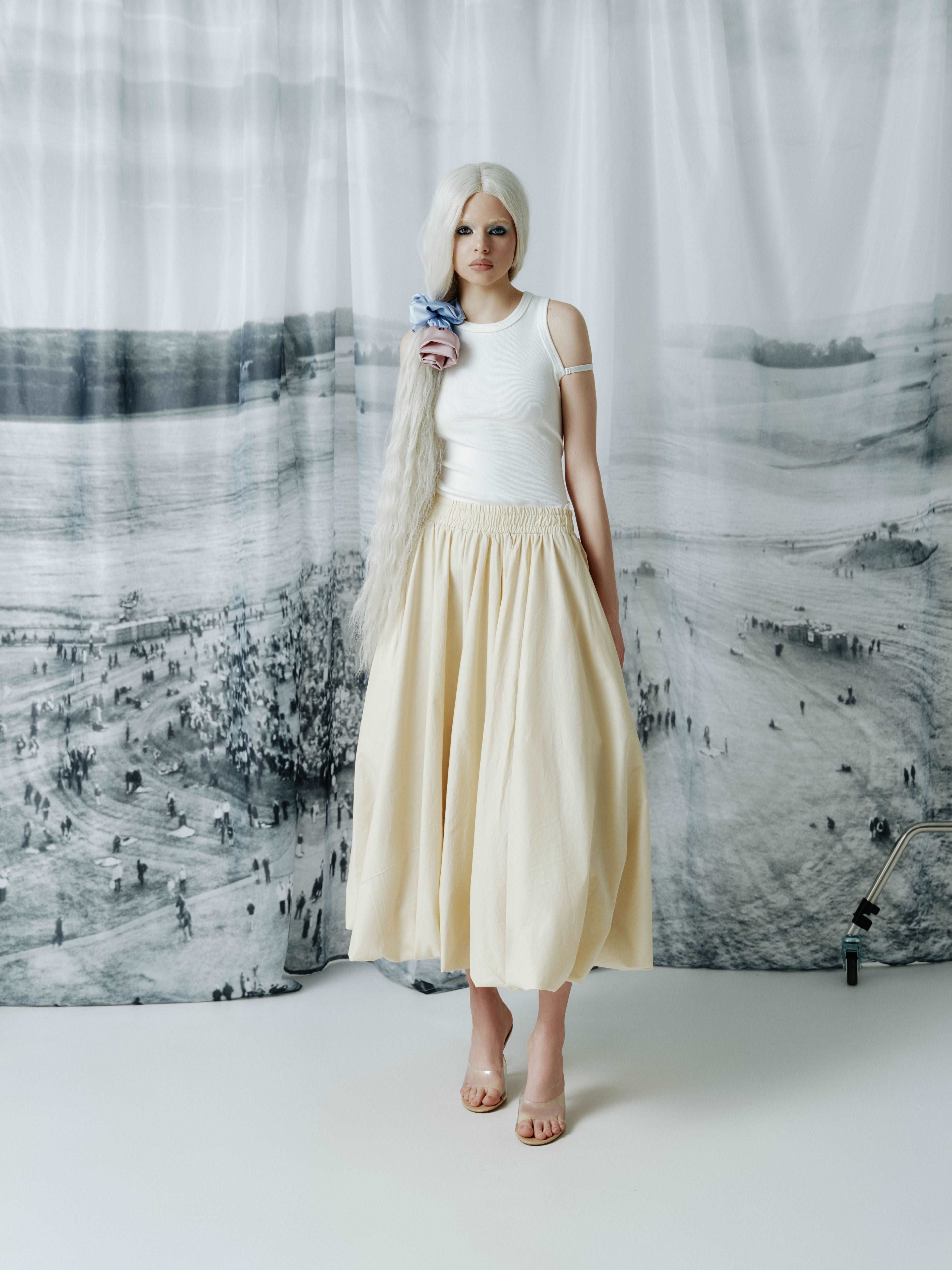 Side view of balloon skirt showcasing voluminous silhouette and comfortable elastic waistband