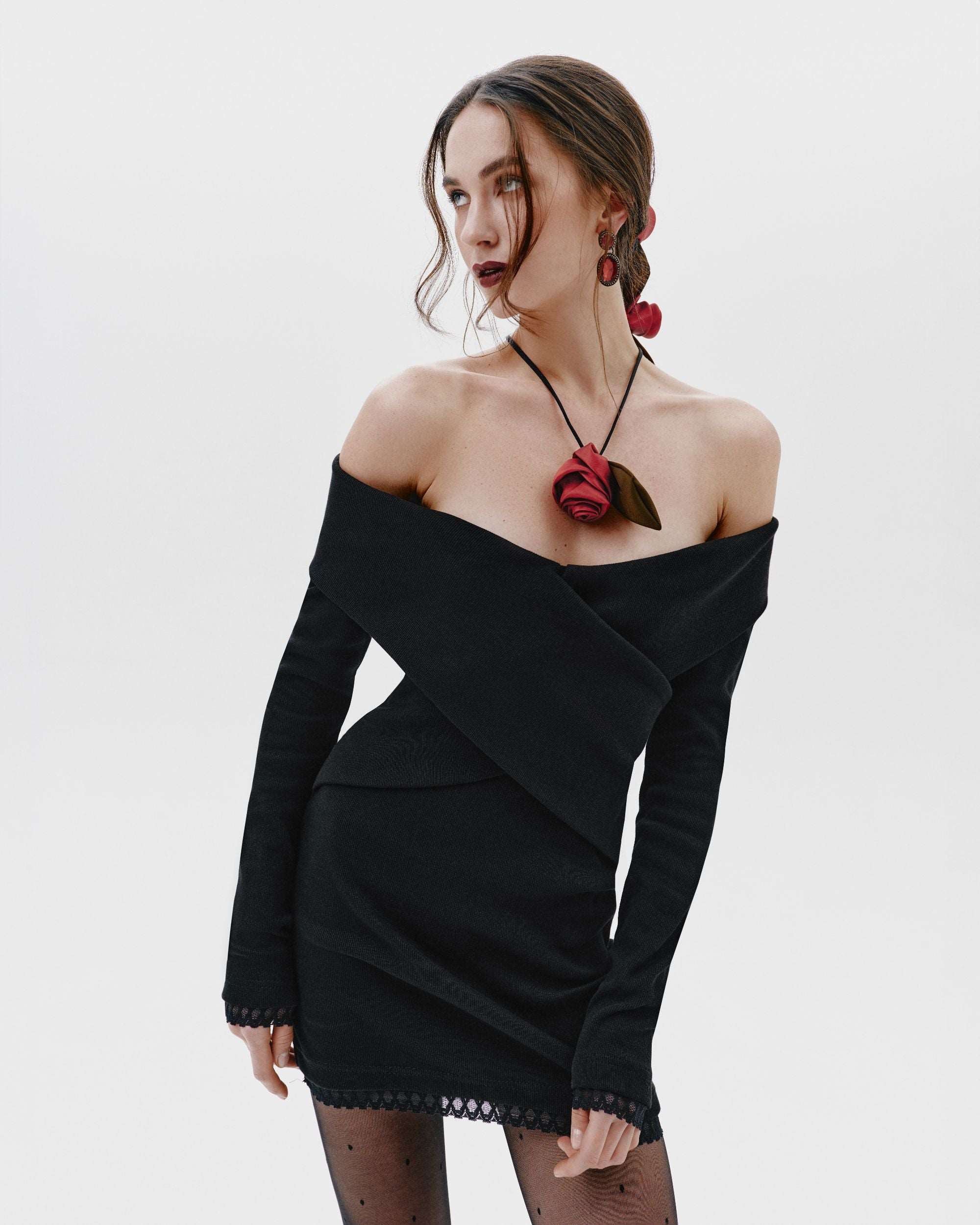 Model wearing a silk hair elastic adorned with roses, symbolizing love, passion, and beauty, crafted by local artisans in Ukraine