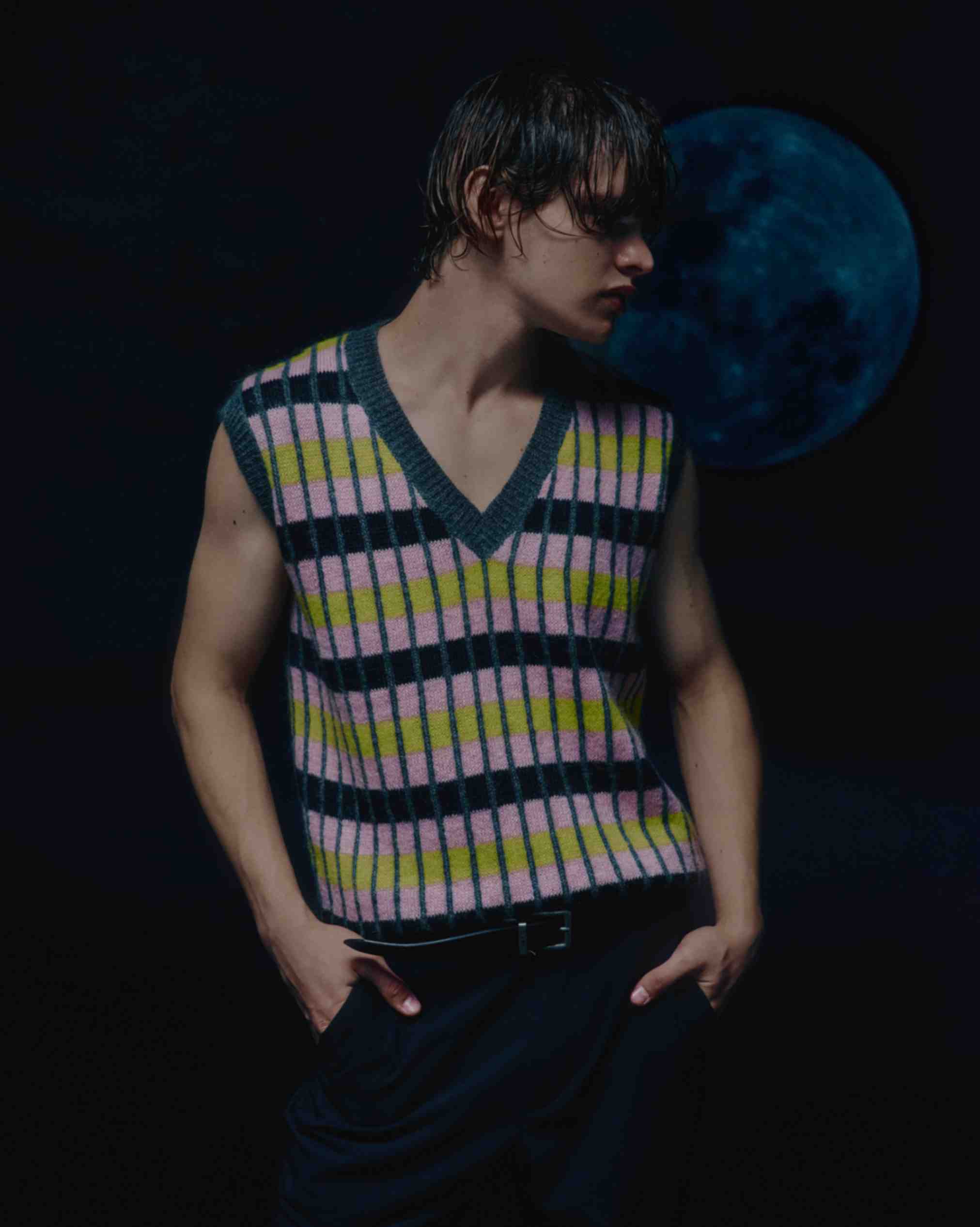 Close-up of the model wearing the vest, emphasizing the softness of the kid mohair fabric
