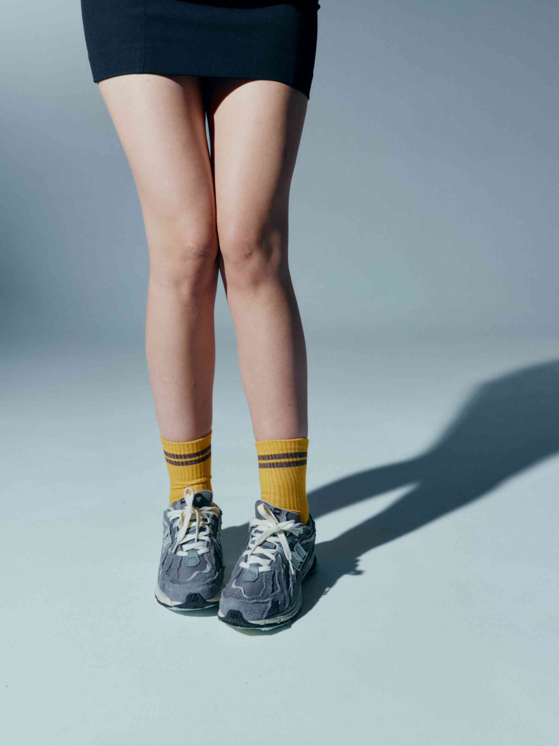 Side view of the cotton socks, emphasizing the bold stripes on the shin for a dynamic appearance